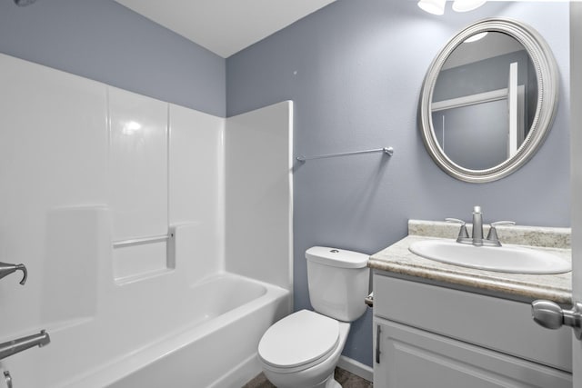 205 17th St, Minot, ND 58703 - full bath with vanity, toilet, tub / shower combination, and baseboards