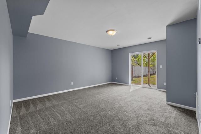 205 17th St, Minot, ND 58703 - carpeted empty room with baseboards