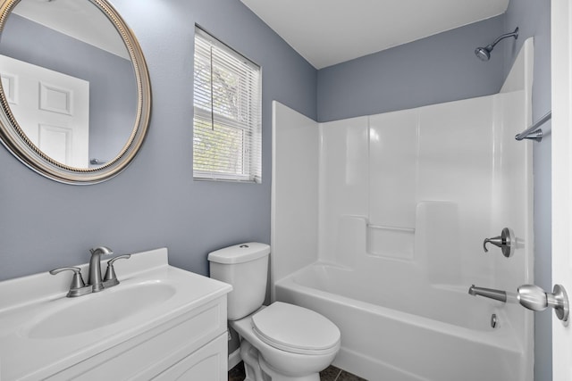 205 17th St, Minot, ND 58703 - full bath with toilet, bathtub / shower combination, and vanity