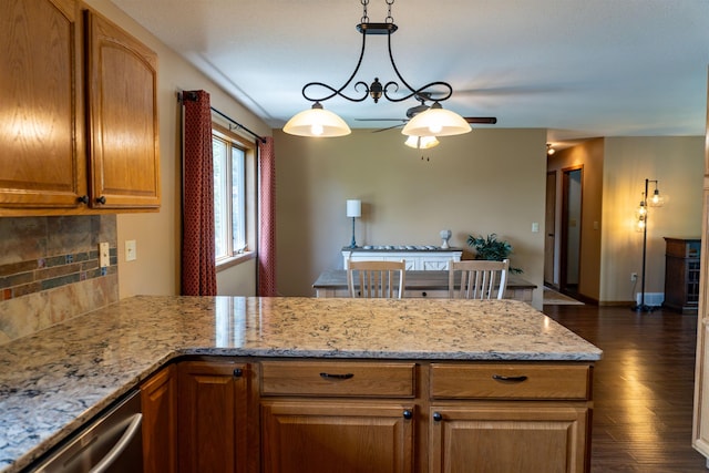 3700 10th Ave, Minot, ND 58701 - kitchen with tasteful backsplash, dark wood-style flooring, a ceiling fan, light stone counters, and dishwasher