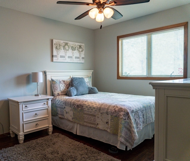 3700 10th Ave, Minot, ND 58701 - bedroom with dark wood finished floors and a ceiling fan