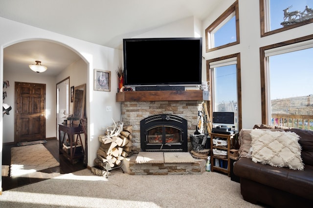 6351 53rd St, Plaza, ND 58771 - living room with arched walkways, a fireplace, and carpet