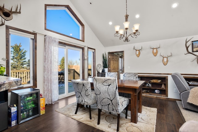 6351 53rd St, Plaza, ND 58771 - dining area with high vaulted ceiling, a chandelier, beverage cooler, wood finished floors, and recessed lighting