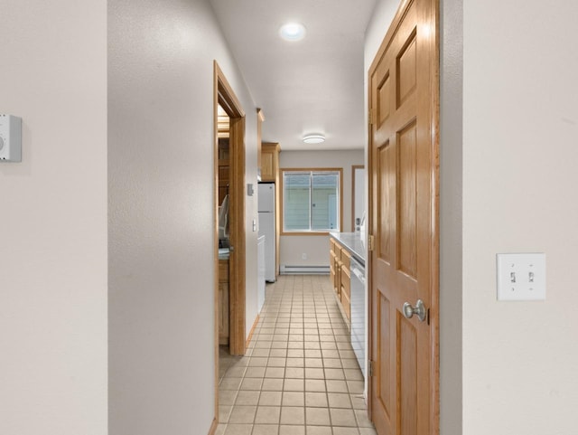 2301 2nd Ave Unit 2, Minot, ND 58701 - hall with light tile patterned flooring, a baseboard radiator, and recessed lighting