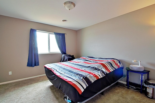 5304 15th Ave, Minot, ND 58701 - bedroom featuring carpet flooring and baseboards