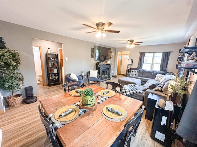 101 6th St, Minot, ND 58703 - dining space with a ceiling fan and light wood-style floors