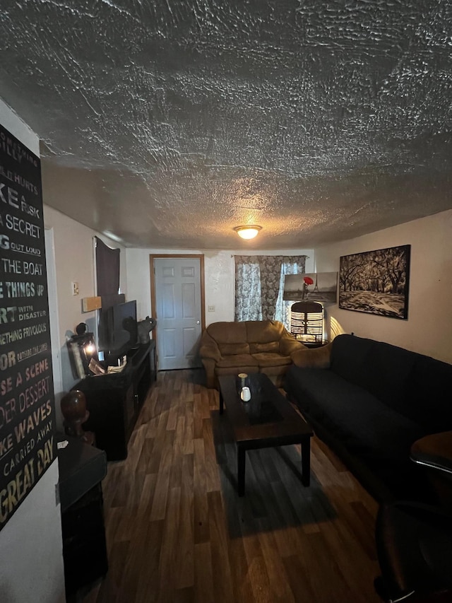 622 Central Ave, Minot, ND 58701 - living room with wood finished floors and a textured ceiling