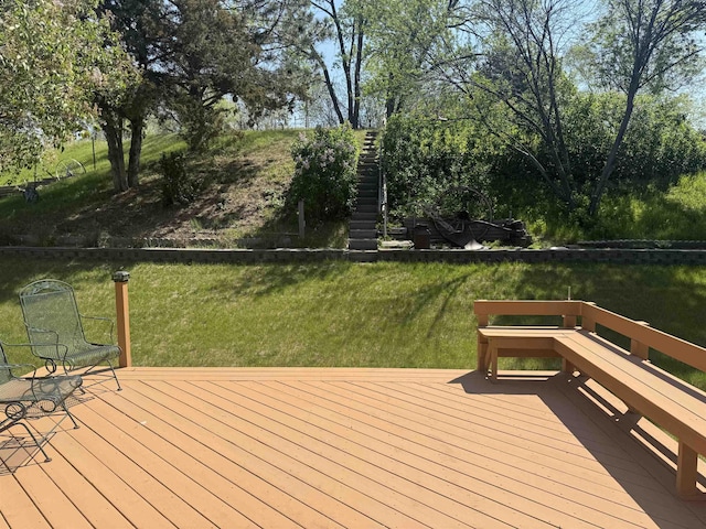 1130 8th St, Minot, ND 58703 - wooden deck featuring stairs and a yard