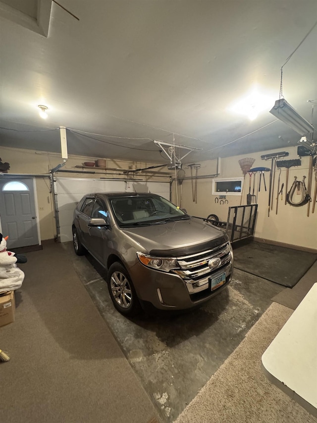 1130 8th St, Minot, ND 58703 - garage with baseboards
