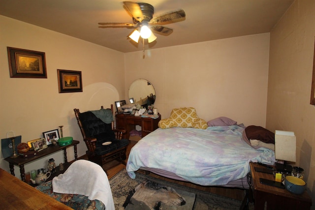 506 W Ave, Granville, ND 58741 - bedroom featuring ceiling fan and wood finished floors