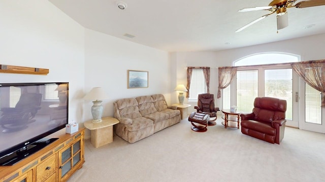 2700 18th Ave, Minot, ND 58701 - living area with light carpet and a ceiling fan