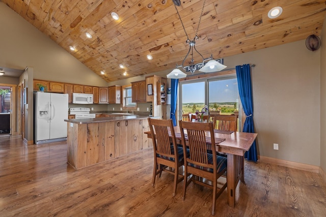 1164 100th St, Bottineau, ND 58318 - dining area featuring light wood-style flooring, wooden ceiling, baseboards, and high vaulted ceiling