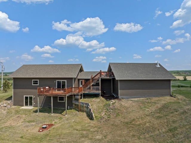 1164 100th St, Bottineau, ND 58318 - rear view of property with stairs, a deck, an attached garage, a yard, and a shingled roof