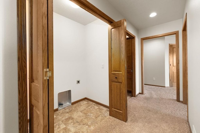 1600 16th St, Minot, ND 58701 - laundry area with hookup for an electric dryer, baseboards, and recessed lighting