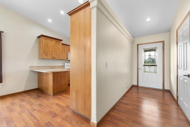 1600 16th St, Minot, ND 58701 - entryway with wood finished floors, recessed lighting, and baseboards