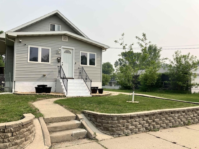 430 NW 2nd Ave, Minot, ND 58703 - view of front of property with a front lawn
