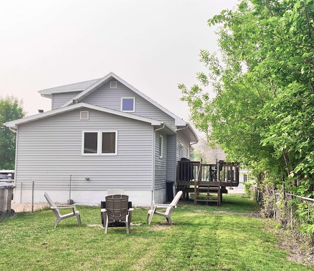 430 NW 2nd Ave, Minot, ND 58703 - rear view of property featuring a wooden deck