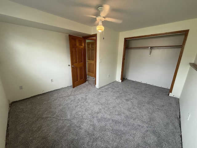 619 25th Ave, Minot, ND 58703 - unfurnished bedroom with a closet, carpet, and ceiling fan