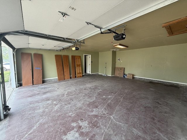 619 25th Ave, Minot, ND 58703 - garage with a garage door opener