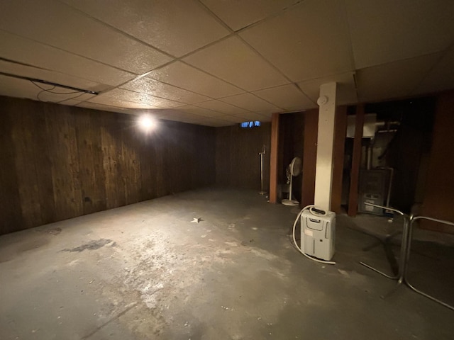 1107 SE 2nd St, Minot, ND 58701 - finished basement with a drop ceiling and wood walls