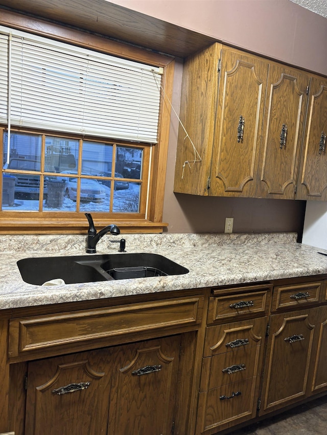 1107 SE 2nd St, Minot, ND 58701 - kitchen with a sink