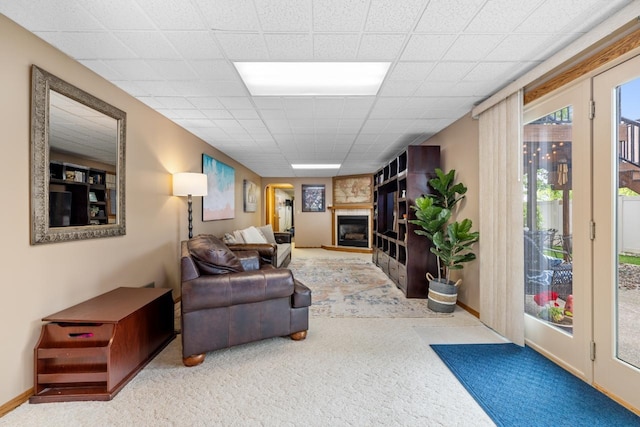 2509 11th Ave, Minot, ND 58703 - living area with carpet, a large fireplace, and baseboards