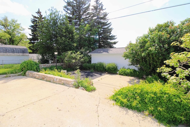 820 SW 5th St, Minot, ND 58701 - view of yard featuring a patio area