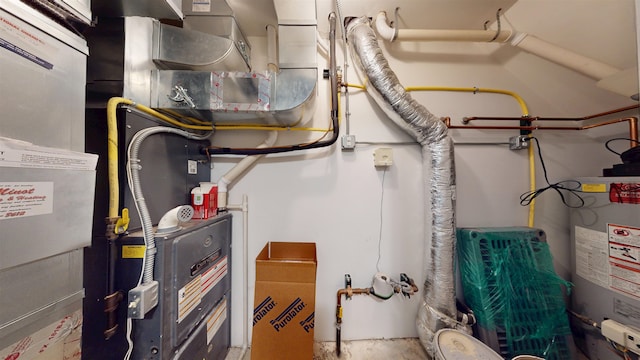 2947 8th St, Minot, ND 58703 - utility room featuring water heater
