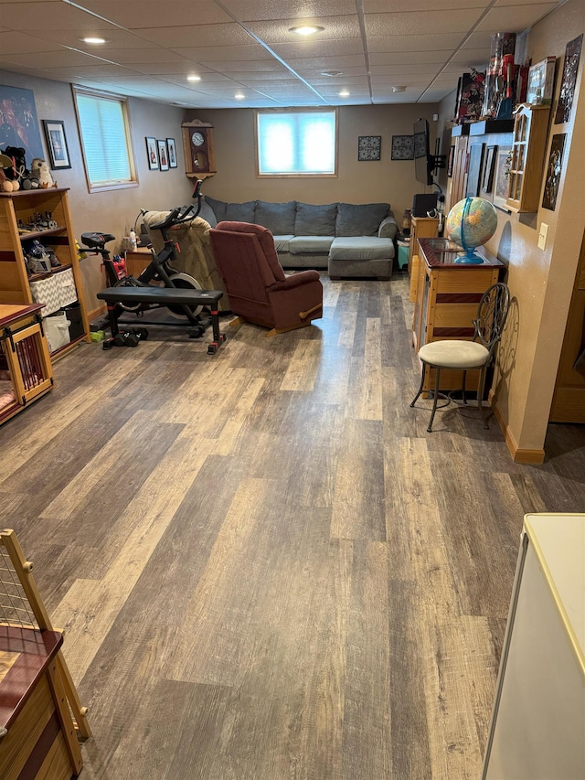 919 9th St, Minot, ND 58703 - living room with wood finished floors and a drop ceiling