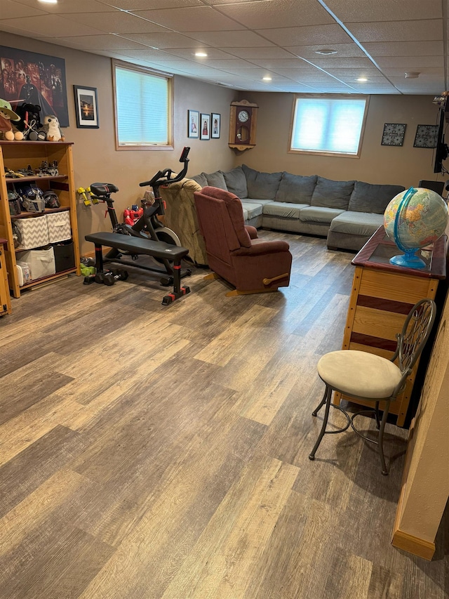 919 9th St, Minot, ND 58703 - living area featuring a paneled ceiling and wood finished floors