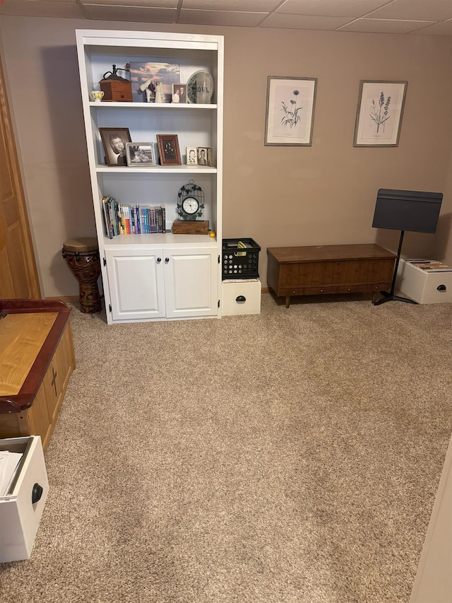919 9th St, Minot, ND 58703 - sitting room with a drop ceiling and carpet flooring