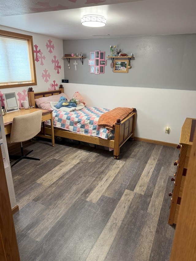 919 9th St, Minot, ND 58703 - bedroom featuring wood finished floors