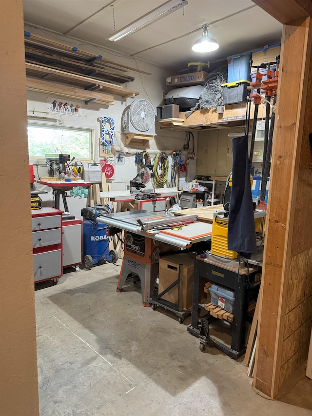 919 9th St, Minot, ND 58703 - garage featuring a workshop area