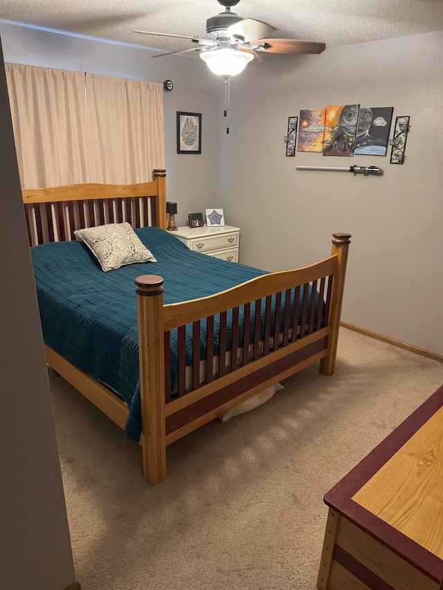 919 9th St, Minot, ND 58703 - carpeted bedroom with ceiling fan