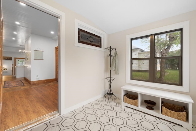 901 3rd St, Minot, ND 58701 - mudroom with baseboards, recessed lighting, and lofted ceiling