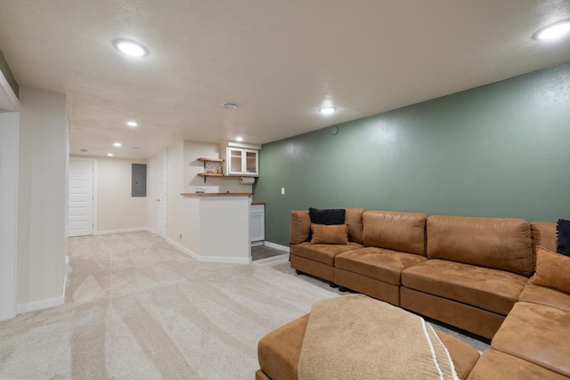 901 3rd St, Minot, ND 58701 - living room featuring recessed lighting, light carpet, bar area, electric panel, and baseboards