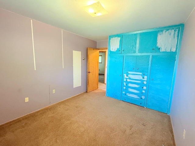 30 1st St, Sawyer, ND 58781 - unfurnished bedroom with carpet flooring and a closet