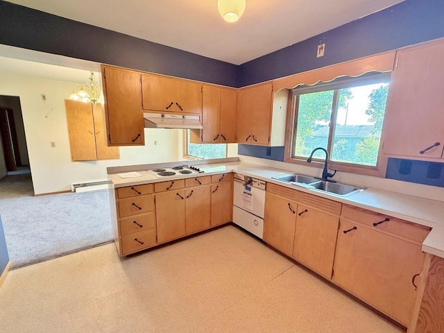 30 1st St, Sawyer, ND 58781 - kitchen with a sink, under cabinet range hood, white appliances, light countertops, and light flooring