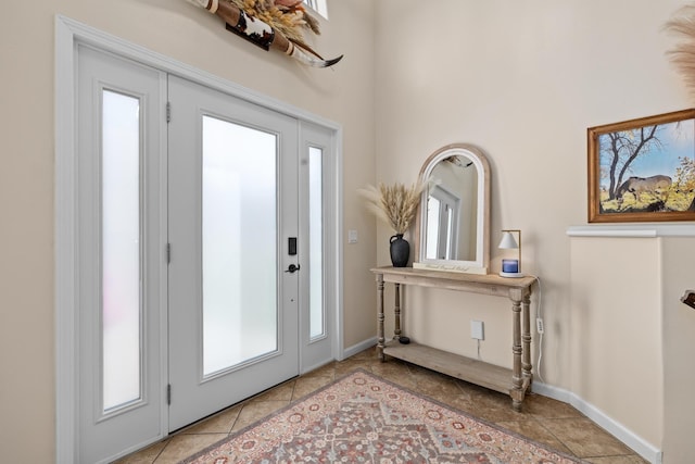 1321 Golden Valley Ln, Minot, ND 58703 - entrance foyer with baseboards and a high ceiling