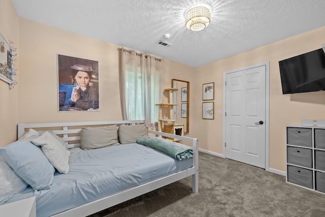 1321 Golden Valley Ln, Minot, ND 58703 - bedroom with carpet, a textured ceiling, and baseboards