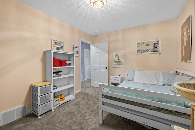 1321 Golden Valley Ln, Minot, ND 58703 - bedroom with carpet flooring, a textured ceiling, and baseboards
