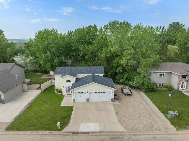 1321 Golden Valley Ln, Minot, ND 58703 - aerial view of property and surrounding area featuring a tree filled landscape