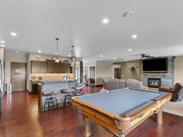 6125 11th Ave, Minot, ND 58701 - playroom featuring billiards table, wet bar, a ceiling fan, a large fireplace, and recessed lighting