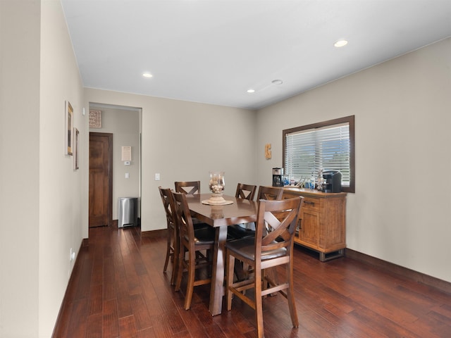 6125 11th Ave, Minot, ND 58701 - dining space featuring dark wood-style flooring, recessed lighting, and baseboards