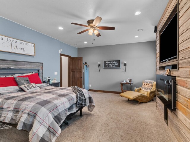 6125 11th Ave, Minot, ND 58701 - bedroom featuring a fireplace, carpet floors, recessed lighting, and ceiling fan