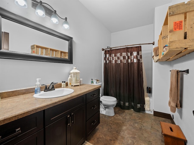6125 11th Ave, Minot, ND 58701 - full bathroom featuring toilet, vanity, a shower with curtain, and baseboards