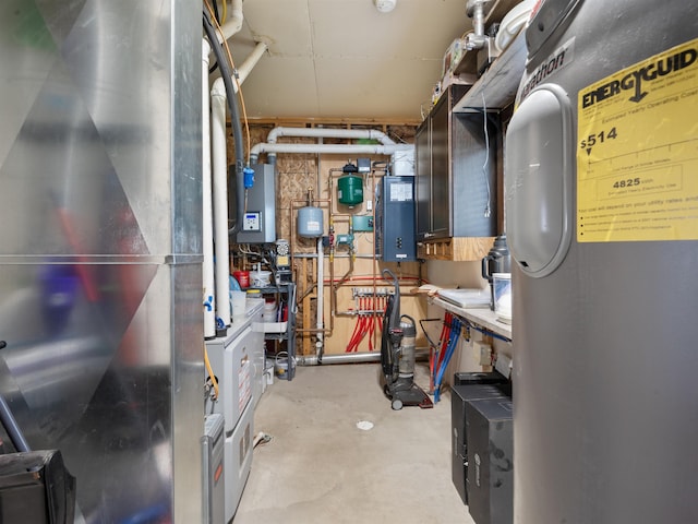 6125 11th Ave, Minot, ND 58701 - utility room featuring water heater and heating unit