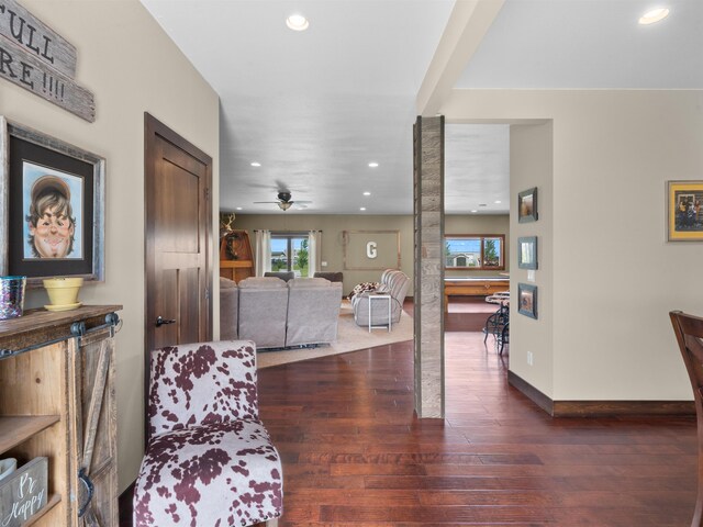 6125 11th Ave, Minot, ND 58701 - living area with hardwood / wood-style floors, recessed lighting, a ceiling fan, and baseboards