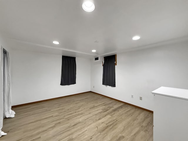 424 26th St, Minot, ND 58703 - unfurnished room featuring recessed lighting, light wood-style floors, and baseboards