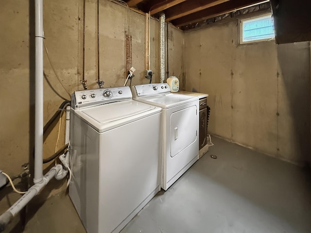 424 26th St, Minot, ND 58703 - laundry room featuring separate washer and dryer